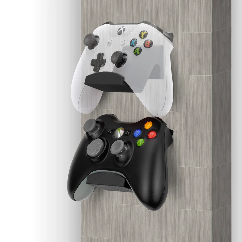 Lot de plusieurs supports muraux universels pour manettes de jeu (UGC1) compatibles avec Xbox, PlayStation, PC et autres consoles.